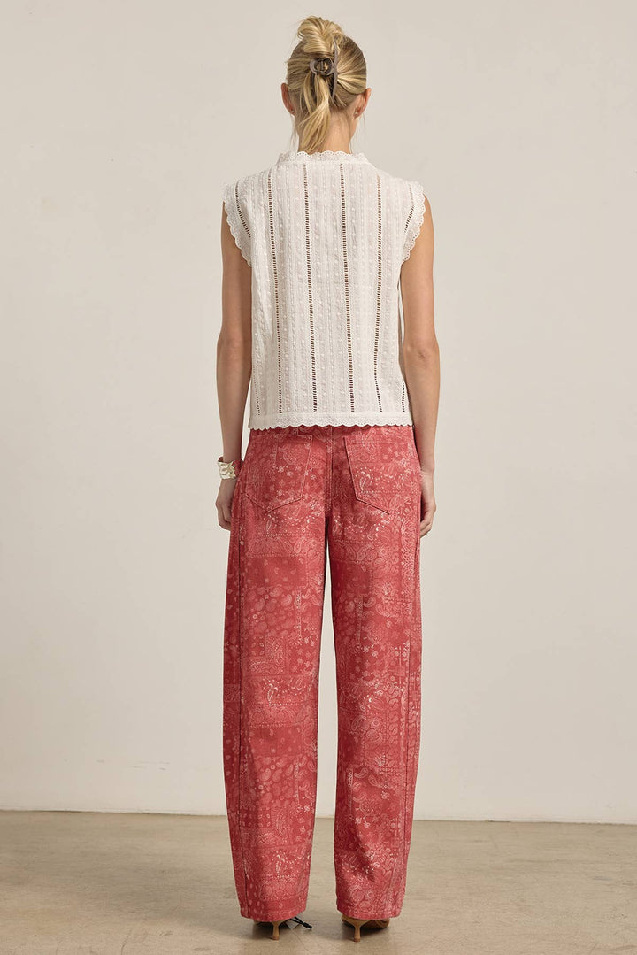 Woman wearing red wide leg denim pants
