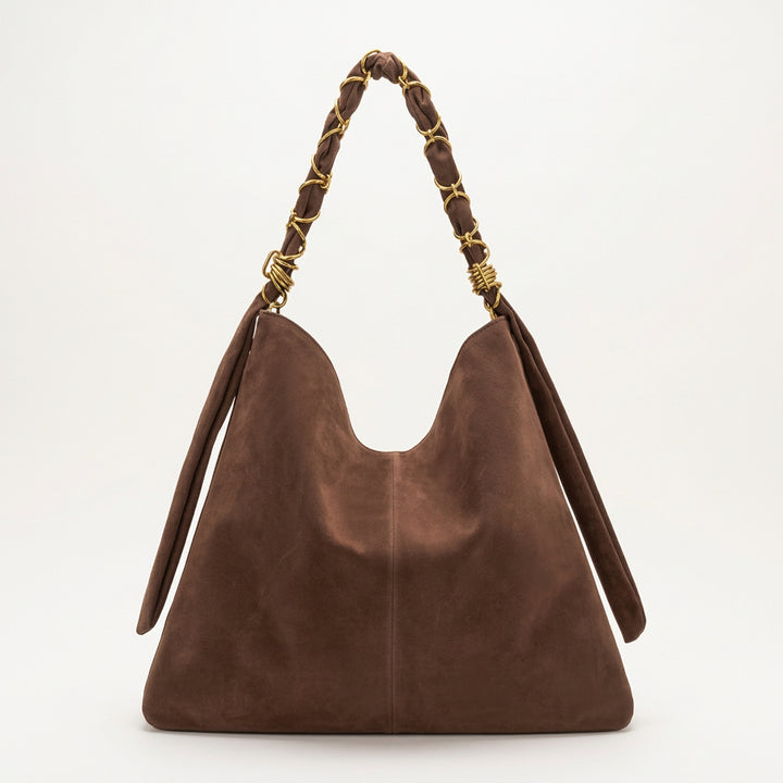 A brown faux suede hobo shoulder bag with a braided brown leather and gold-tone chain strap, shown against a plain white background.