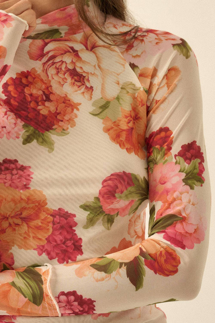 Floral patterned mesh fabric with large flowers on a beige background