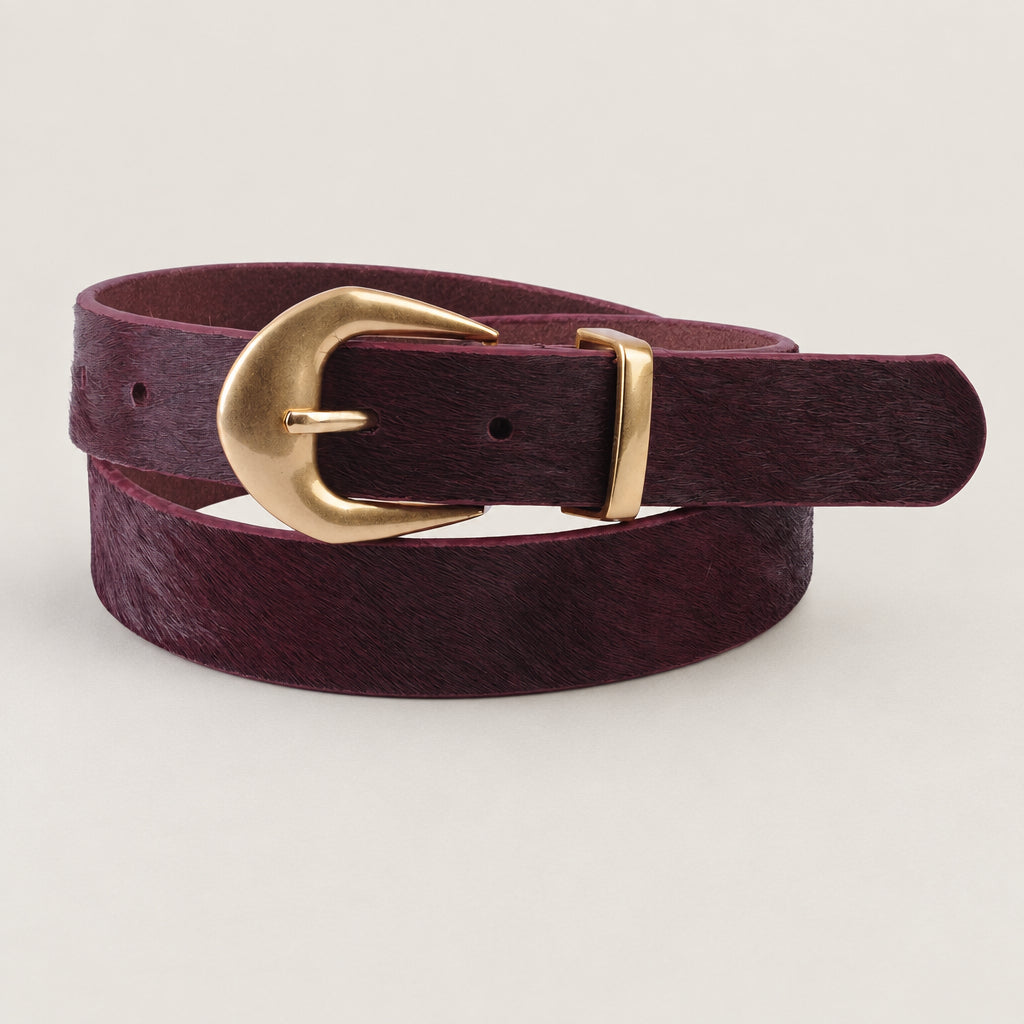 Burgundy leather belt with a gold buckle on a white background