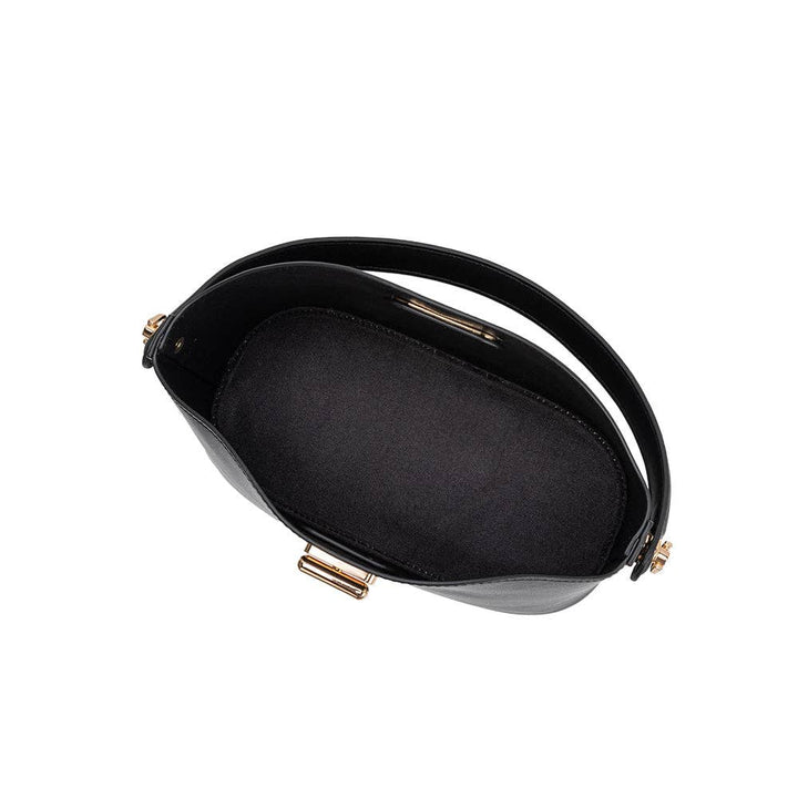 Black crossbody handbag with gold accents on a white background