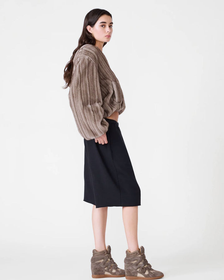 woman wearing faux fur winter jacket with hood