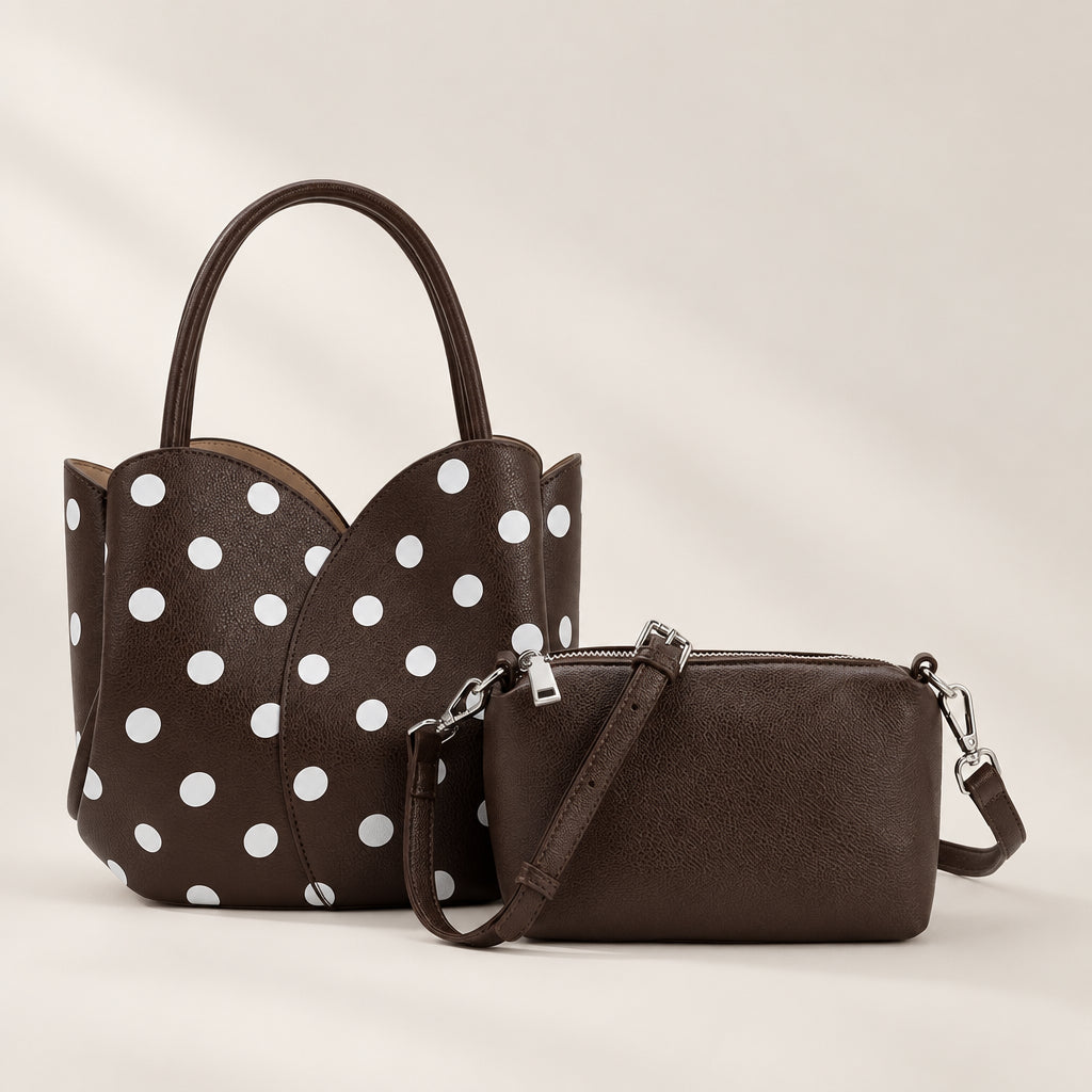A dark brown vegan leather handbag set featuring a large handbag with white polka dots and a matching small crossbody pouch, both shown on a plain white background.