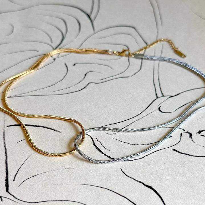 Gold & silver woman's chain necklace.