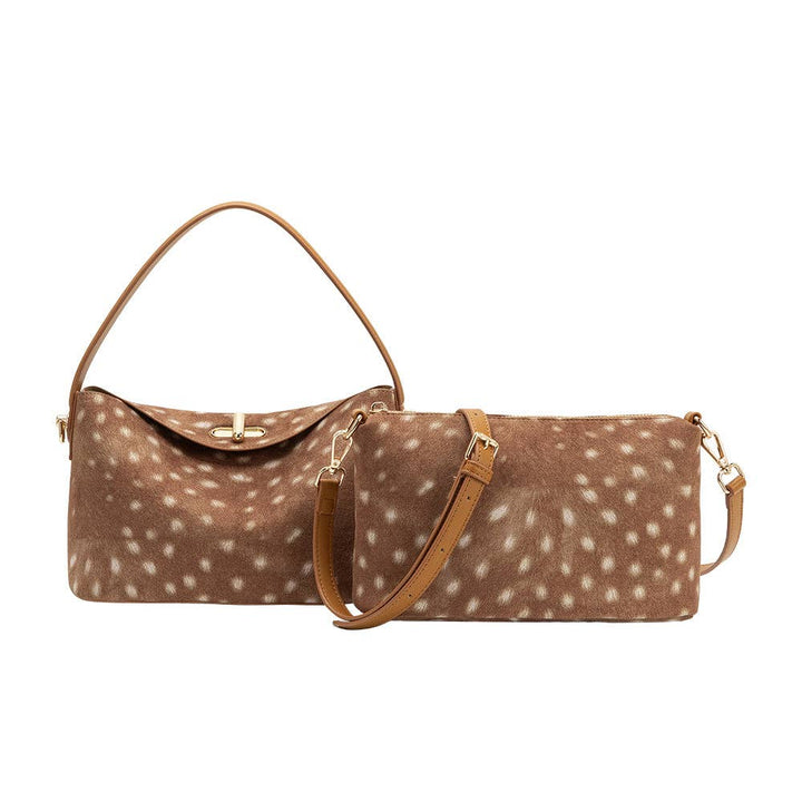 Brown handbag with bambi print on a white background