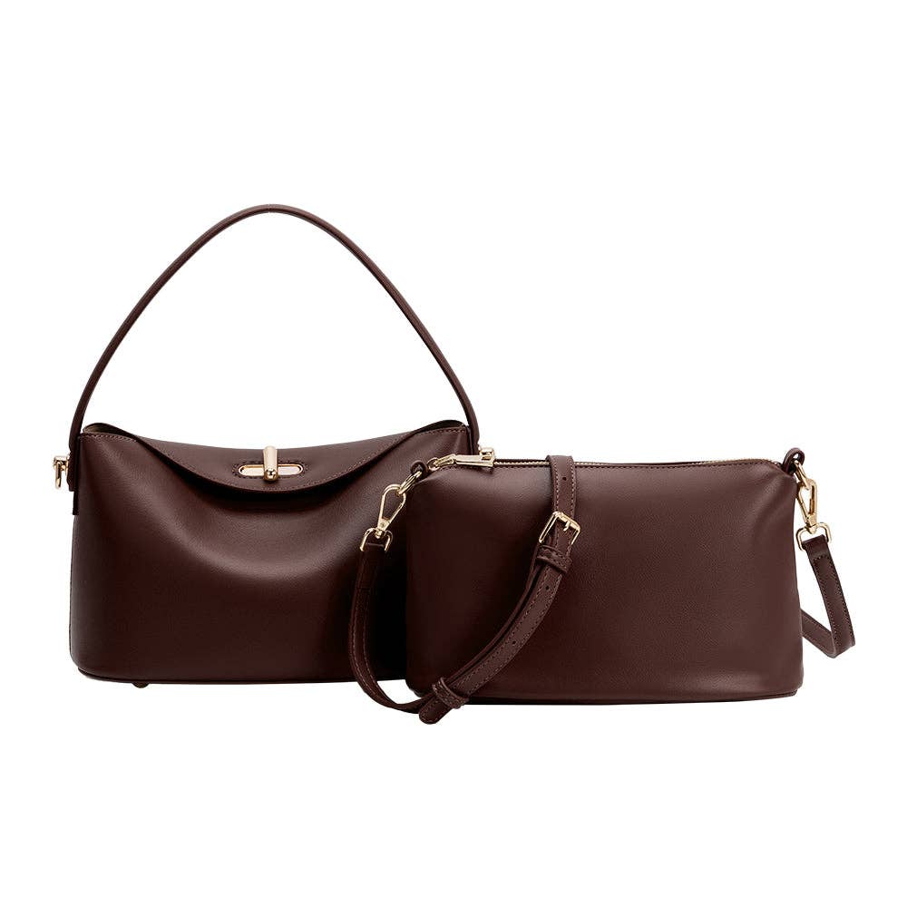 Brown vegan leather handbag with a shoulder strap on a white background