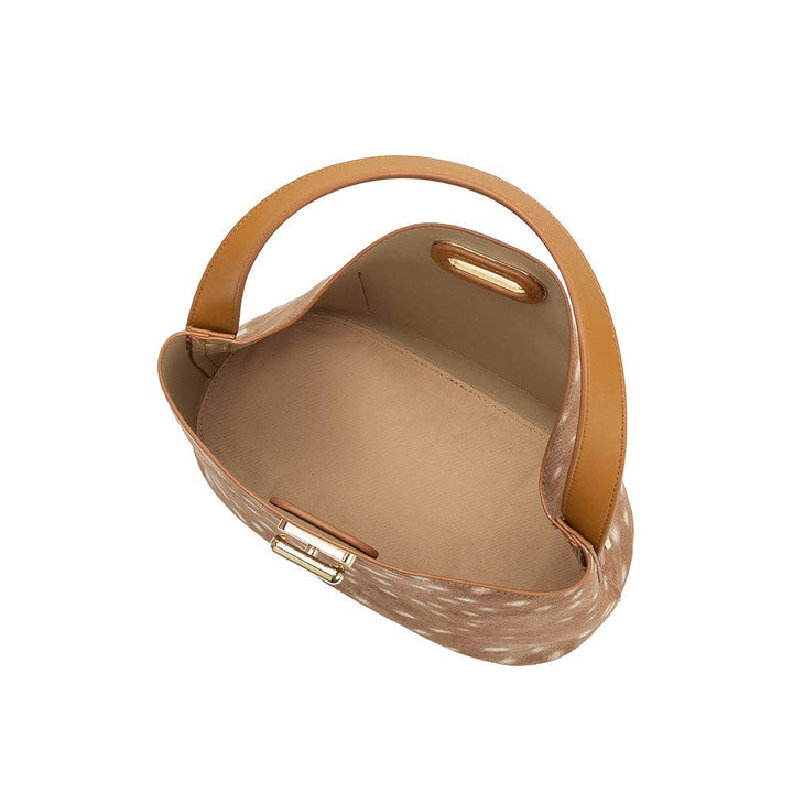 Beige handbag with a bambi print surface and brown handle on a white background