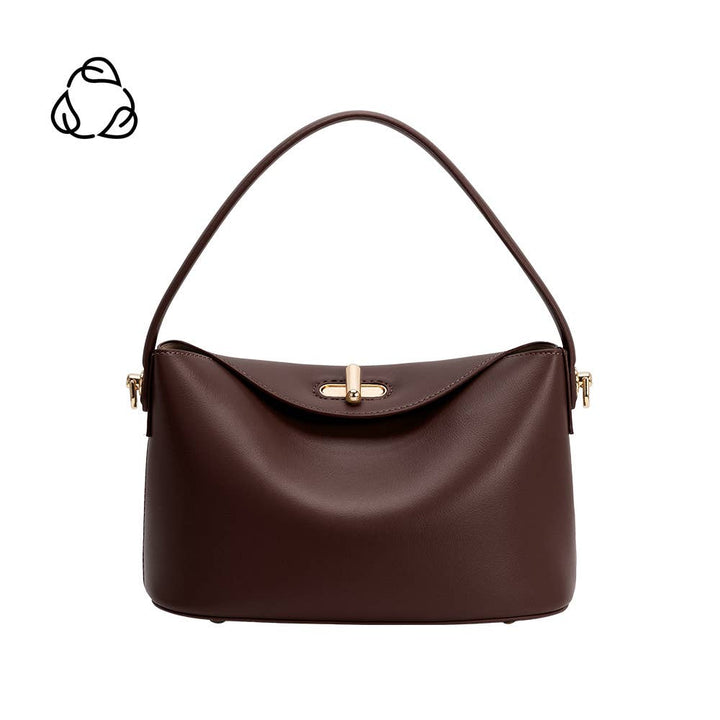 A dark brown vegan leather shoulder bag with a curved top handle and gold-tone hardware, shown on a plain white background with a small black logo in the top-left corner.
