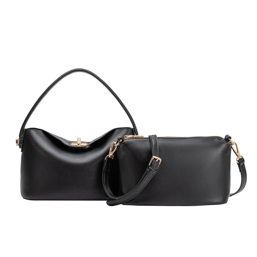 Black vegan leather handbag with gold accents on a white background