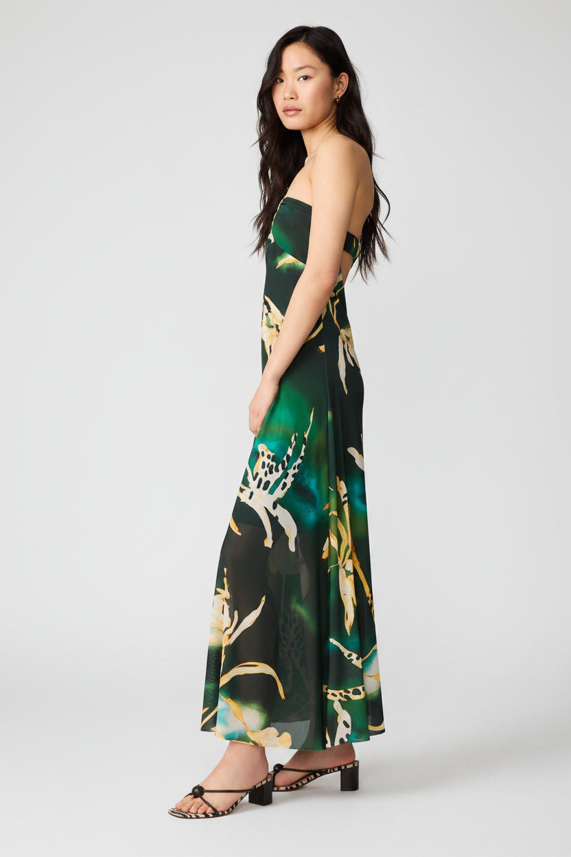 Woman wearing a floral dress with a white background